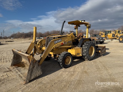 2002 Deere 210 LE 4x4 Pala gommata per cura del verde