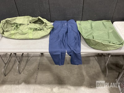 (16) Duffel Bags, (14) Pairs of Women’s Slacks & Assorted It