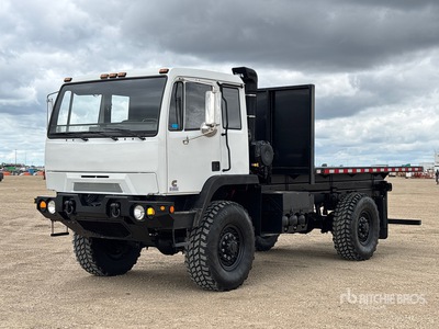 2012 BAE Systems Titan XD 4400 4x4 Extended Cab Flatbed Truck
