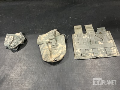 (77) M4 Two Mag Pouches, (60) First Aid Kit Pouches & Assorted Items