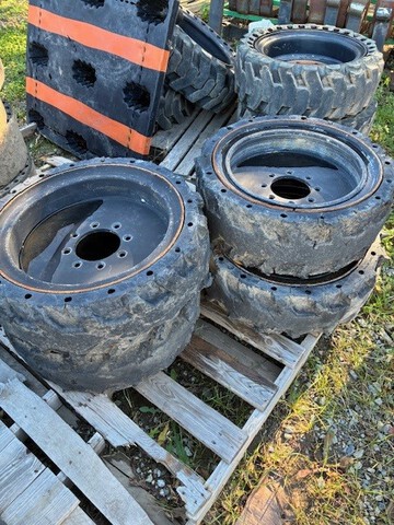 Quantity of (32) Skid Steer Tires & Wheels Quantity of (32) Skid Steer Tires & Wheels