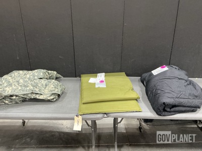 (71) Wet Weather Poncho Liners, (17) Sleeping Bags & Assorted Items