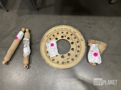 (1) Incandescent Lamp, (2) Shock Absorbers, (1) Wheel & Assorted Items