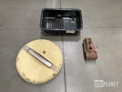 (7) Oil Pans, (1) Rods Ends, (1) Manhole Cover & Assorted Items
