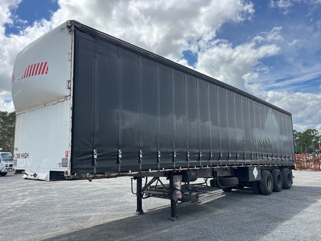 1987 Krueger 13.2 m Tri/A Tautliner Trailer