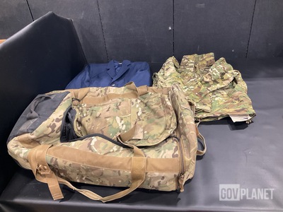 (1) Duffel Bag, (7) Wet Weather Jackets, (18) Men’s Coats & Assorted Items