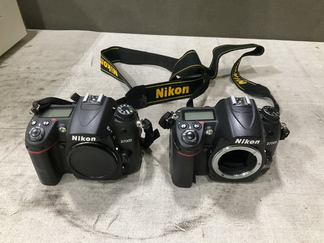 (6) Nikon D7000 Digital Cameras