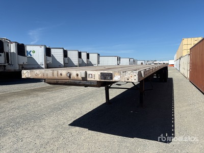 1999 Transcraft 53 ft T/A Spread Axle Flatbed Trailer