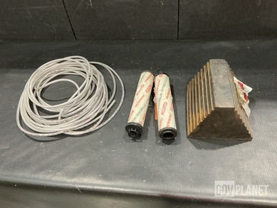 (1) Wheel Chock, (2) Filter Elements, (1,388’) of Tubing & Assorted Items