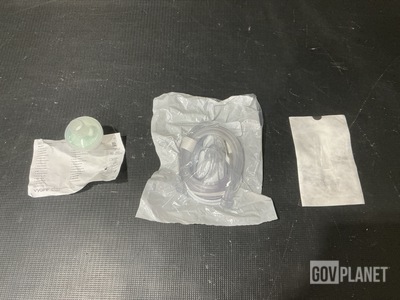 (2) Packages of HEPA Filters, (3) Packages of Oxygen Masks & Assorted Items