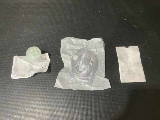 (2) Packages of HEPA Filters, (3) Packages of Oxygen Masks & Assorted Items