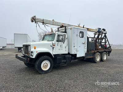 1991 International 2574 6x4 Camion à câbles lisses