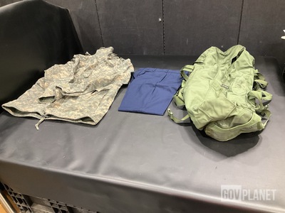 (16) Duffel Bags, (11) Pairs of Men’s Trousers & Assorted Items