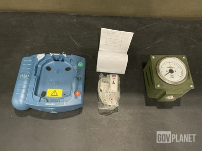 (1) Defibrillator Component, (2) Pressure Indicators & Assorted Items