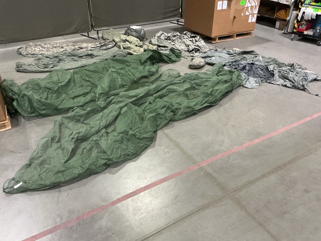 (24) Insect Protectors, (3) Combat Shelters, (7) Sleeping Mats & Assorted Items
