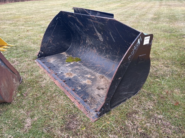Cat 100 in Wheel Loader Bucket