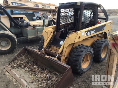 John Deere 320 Minicargadora