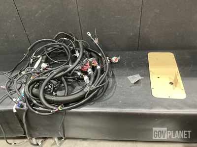 (11) Mounting Plates, (1) Protective Cover, (1) Wiring Harness & Assorted Items