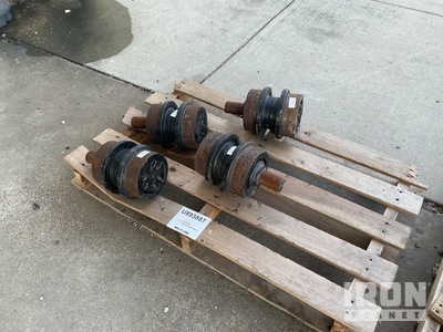 Qty of (4) Cat 300-4545 Carrier Rollers