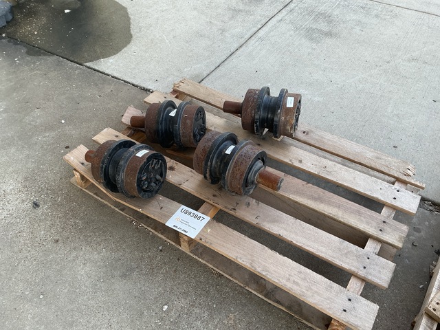 Qty of (4) Cat 300-4545 Carrier Rollers