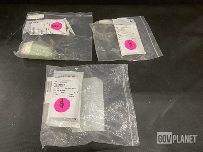 (62) Retaining Rings, (1) Bracket, (1) Roller Bearing & Assorted Items