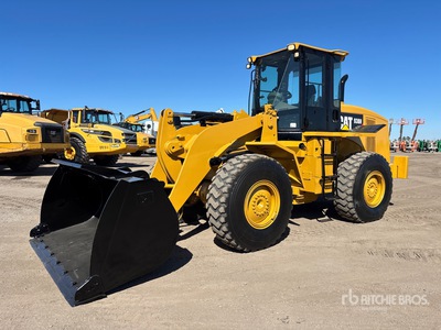 2011 Cat 938H Pala gommata