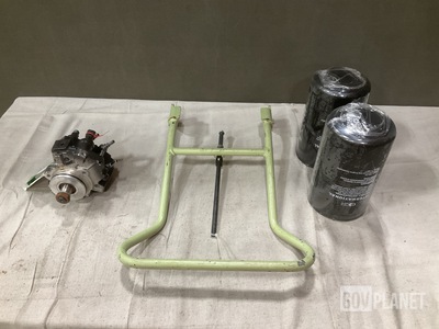 (1) Footrest, (1) Fuel Metering Pump & (18) Oil Filters & Assorted Items