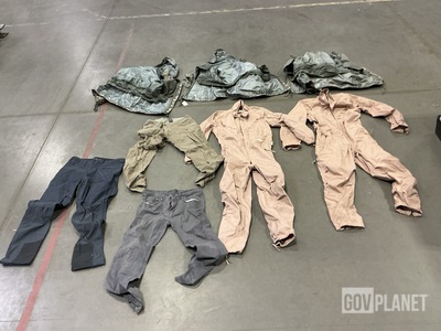 (2) Pairs of Combat Vehicle Crewman’s Coveralls, (10) Parkas & Assorted Items