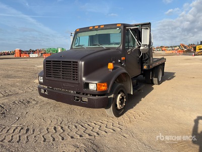 1997 International 4700 4x4 Flatbed Truck