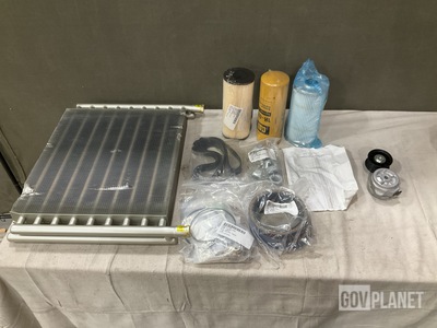 (1) Maintenance Kit, (17) Belt Tensioners, (1) Oil Cooler & Assorted Items