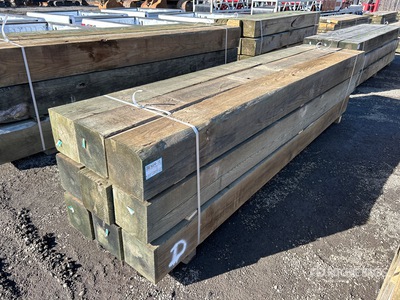 Quantity of (9) Surplus Pressure Treated 10 in x 10 in x 12 ft 木材