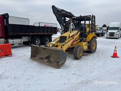 2004 New Holland LB75B 4x4 Chargeuse entretien paysager