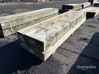 Quantity of (6) Surplus Pressure Treated 10 in x 12 in x 12 ft 木材