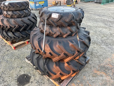 Quantity of (2)14.9-24 (2)8-18 إطارات المعدات