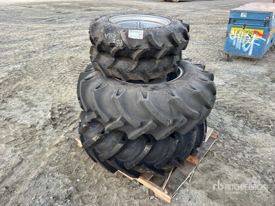 Quantity of (2) 14.9-24 (2) 8-18 إطارات المعدات