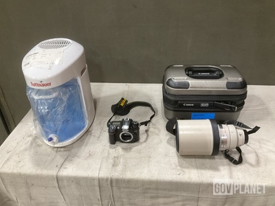 (1) Camera Lens, (1) Digital Camera & Assorted Items