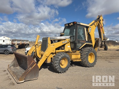 Cat 446B 4x4 Retroexcavadora