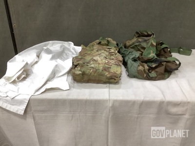 (2) Pairs of Camouflage Pants, (24) Sleep System Carriers & Assorted Items