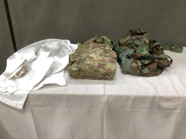 (2) Pairs of Camouflage Pants, (24) Sleep System Carriers & Assorted Items