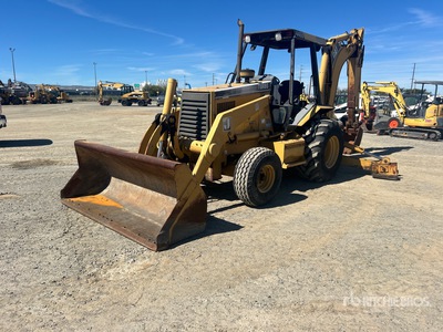 2002 Cat 446B 4x2 لودر خلفي
