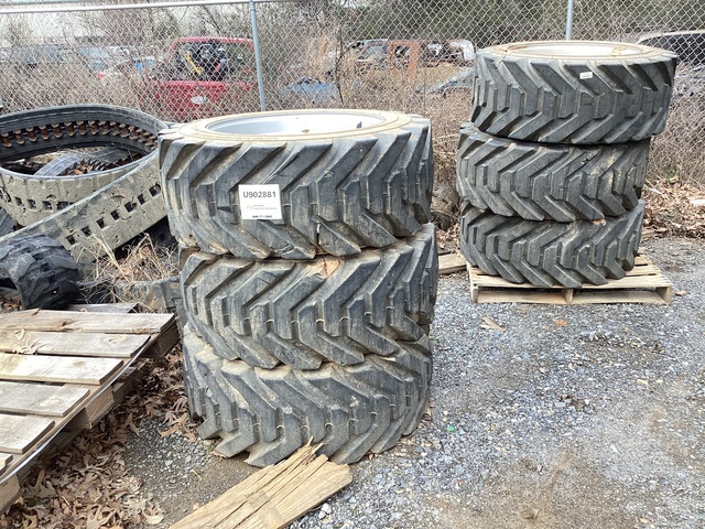 Quantity of (12) Rough Terrain Boom Lift Tires w/ Wheels