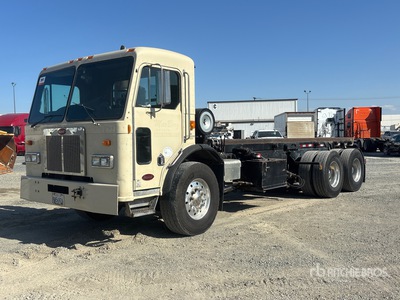 2002 Peterbilt 320 6x4 Roll-Off Truck