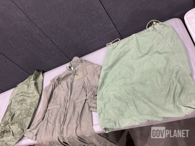 (2) Pairs of Flyer’s Coveralls, (35) Clothing Bags & Assorted Items