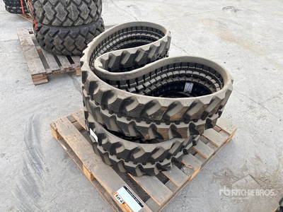 Quantity of (2) 12 in Rubber Tracks (Unused)