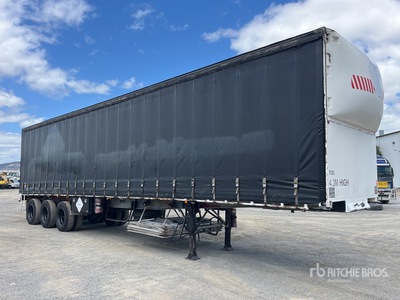 1987 Krueger 13.2 m Tri/A Curtain Side Trailer
