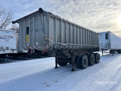 1986 Fruehauf 25 ft Tri/A Rollback Remolque banera