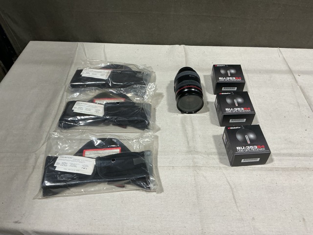 (2) Camera Lenses, (11) GPS Receivers, (50) Neck Protectors & Assorted Items (2) Camera Lenses, (11) GPS Receivers, (50) Neck Protectors & Assorted Items