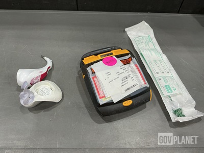 (1) Digital Shade Matching System, (1) Defibrillator & Assorted Items