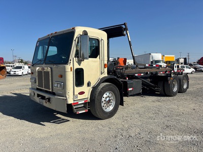 1999 Peterbilt 320 6x4 Roll-Off Truck