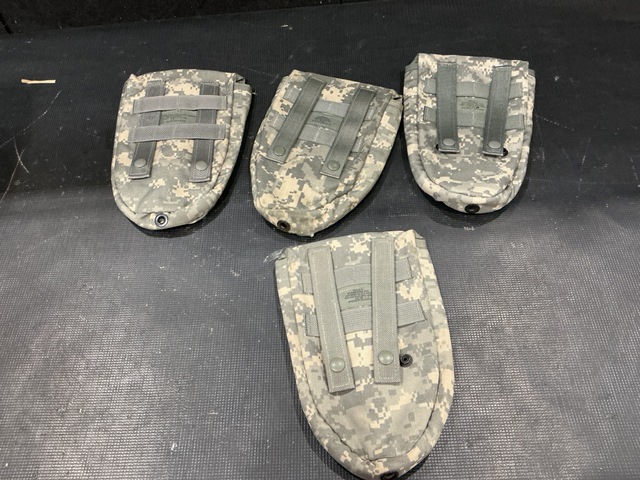(101) Entrenching Tool Carriers